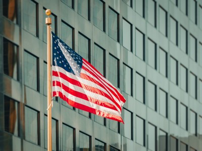 outside of US embassy, showing US flag