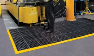 Justrite Notrax anti-fatigue rubber floor mat in warehouse