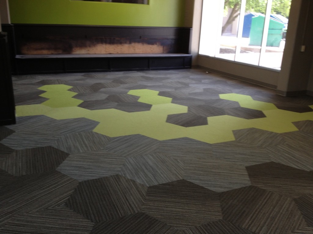 Rocky's Flooring & Crew installing floors