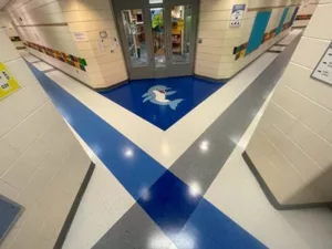 flooring installation with graphic inlay in school