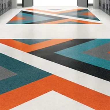 A hallway with colorful linoleum flooring
