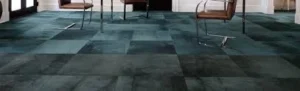 a floor with carpet tile and a chair